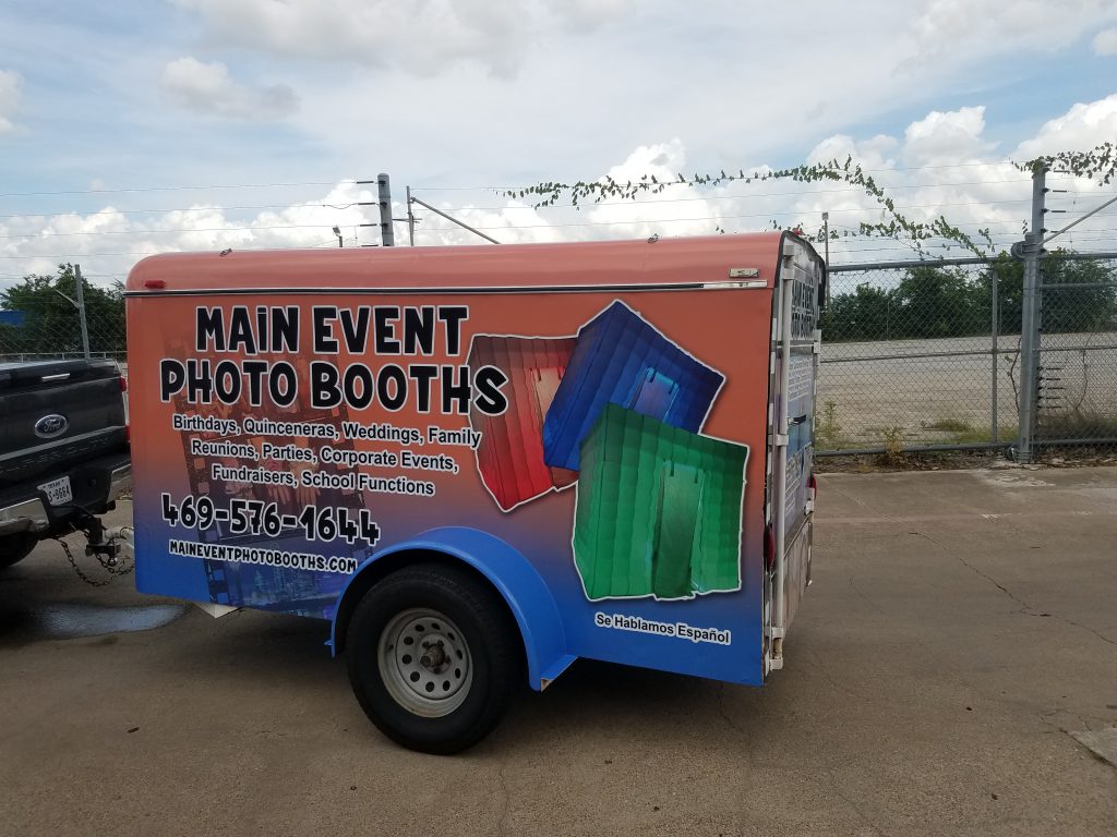 Trailer wrap for Main Event Photo Booths on a cargo trailer by 1st Class Graphics in Mansfield, TX