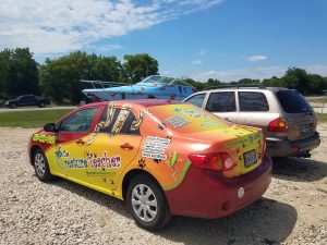 Full vehicle wrap for The Creature Teacher on a sedan by 1st Class Graphics in Mansfield, TX