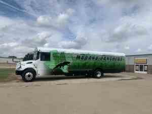 Partial wrap for Mabank Panthers on an IC Bus school bus by 1st Class Graphics in Mansfield, TX