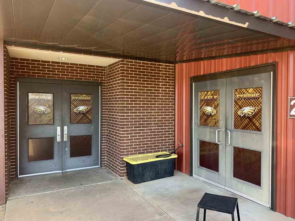 Window graphics on school entrance doors by 1st Class Graphics in Mansfield, TX