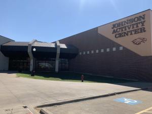 Window graphics for Johnson Activity Center on a building entrance by 1st Class Graphics in Mansfield, TX