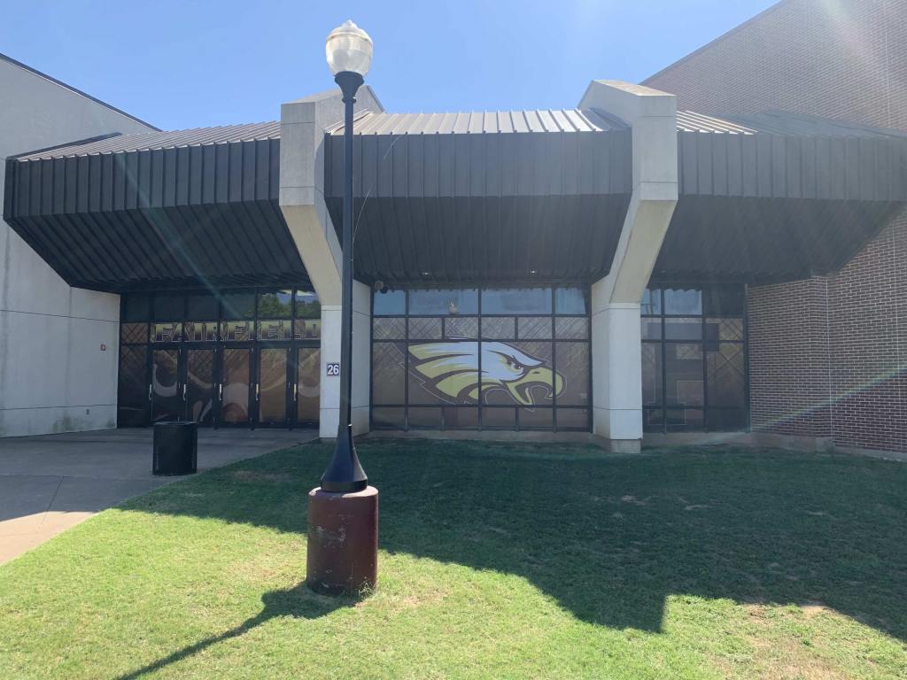 Window graphics on a school building entrance by 1st Class Graphics in Mansfield, TX