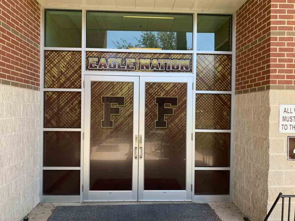 Window graphics on school entrance doors by 1st Class Graphics in Mansfield, TX