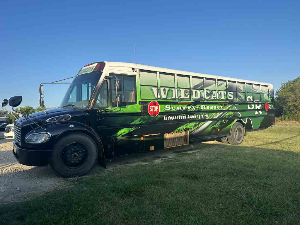 Full vehicle wrap for Scurry-Rosser Independent School District on a school bus by 1st Class Graphics in Mansfield, TX