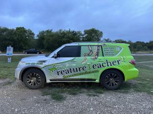 Partial wrap for The Creature Teacher on an SUV by 1st Class Graphics in Mansfield, TX