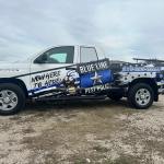 Partial wrap for Blue Line Pest Police on a Toyota Tundra by 1st Class Graphics in Mansfield, TX