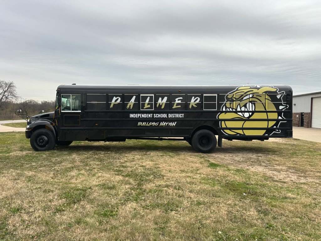 Full vehicle wrap for Palmer Independent School District on a school bus by 1st Class Graphics in Mansfield, TX