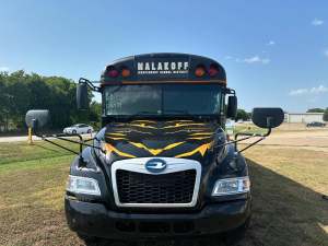 Full vehicle wrap for Malakoff Independent School District on a Blue Bird school bus by 1st Class Graphics in Mansfield, TX