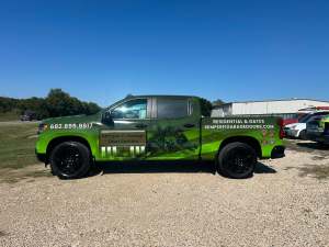 Full vehicle wrap for Semper Fi Garage Door Service on a pickup truck by 1st Class Graphics in Mansfield, TX