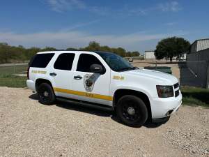 Vinyl lettering for Palmer Fire ESD #9 on a Chevrolet Tahoe by 1st Class Graphics in Mansfield, TX