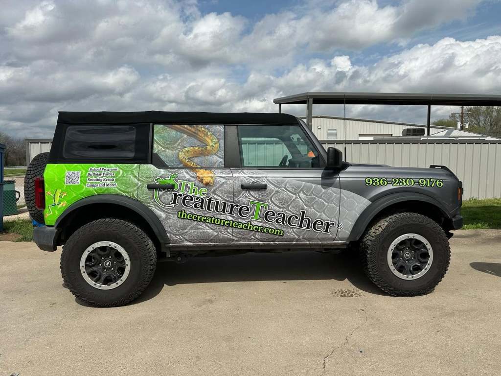 Partial wrap for The Creature Teacher on a Ford Bronco by 1st Class Graphics in Mansfield, TX