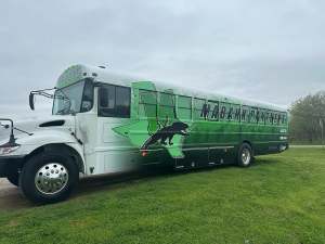 Partial wrap for Mabank Panthers on an IC Bus school bus by 1st Class Graphics in Mansfield, TX