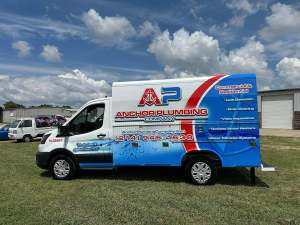Full vehicle wrap for Anchor Plumbing Company on a Ford Transit cutaway service truck by 1st Class Graphics in Mansfield, TX