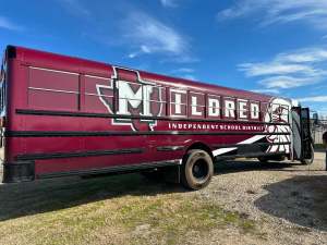Full vehicle wrap for Mildred Independent School District on a school bus by 1st Class Graphics in Mansfield, TX