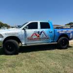 Full vehicle wrap for Touchstone Roofing on a Ram 1500 by 1st Class Graphics in Mansfield, TX