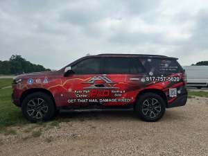 Full vehicle wrap for P&D Auto Hail Center on a Chevrolet Tahoe by 1st Class Graphics in Mansfield, TX