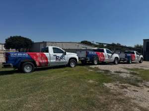 Fleet graphics for DSR Roofing, Welding & Construction on Chevrolet Silverado trucks by 1st Class Graphics in Mansfield, TX