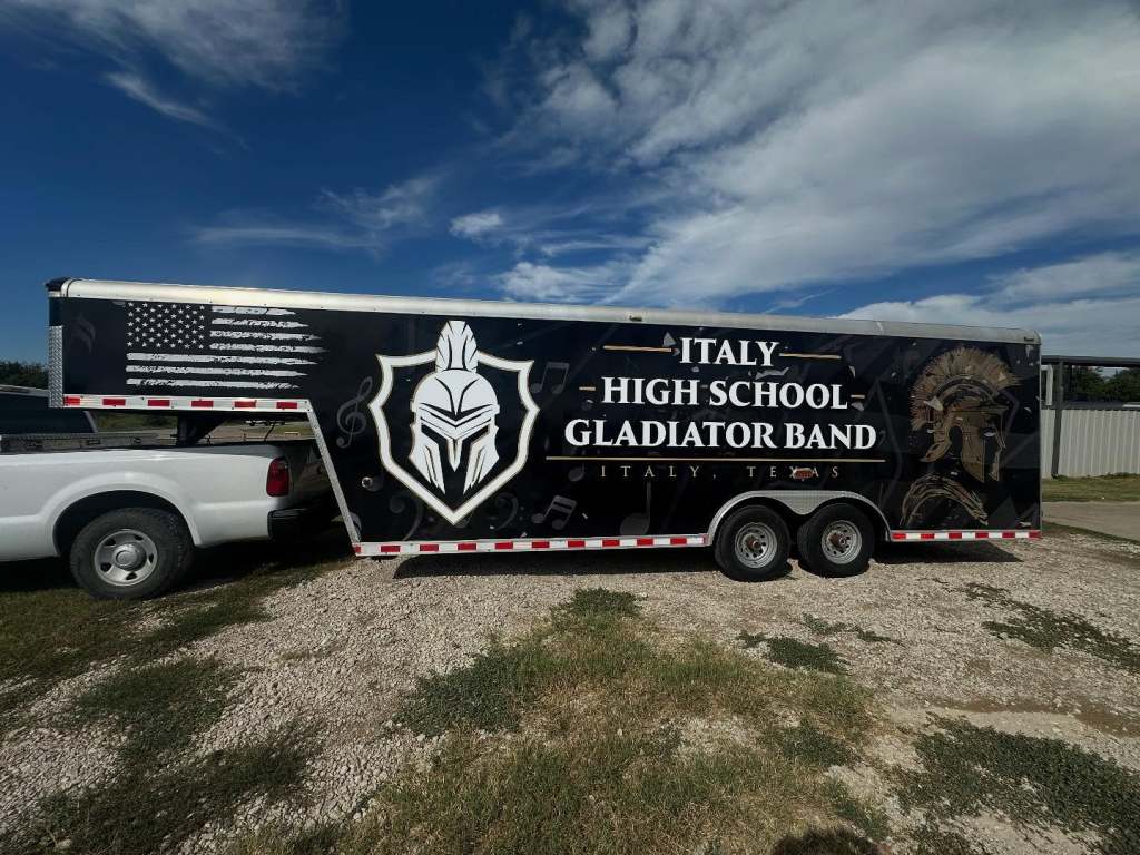 Trailer wrap for Italy High School Gladiator Band on a gooseneck trailer by 1st Class Graphics in Mansfield, TX
