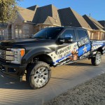 Partial wrap for Blue Line Pest Police on a Ford Super Duty by 1st Class Graphics in Mansfield, TX
