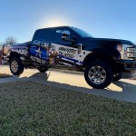 Partial wrap for Blue Line Pest Police on a Ford Super Duty by 1st Class Graphics in Mansfield, TX