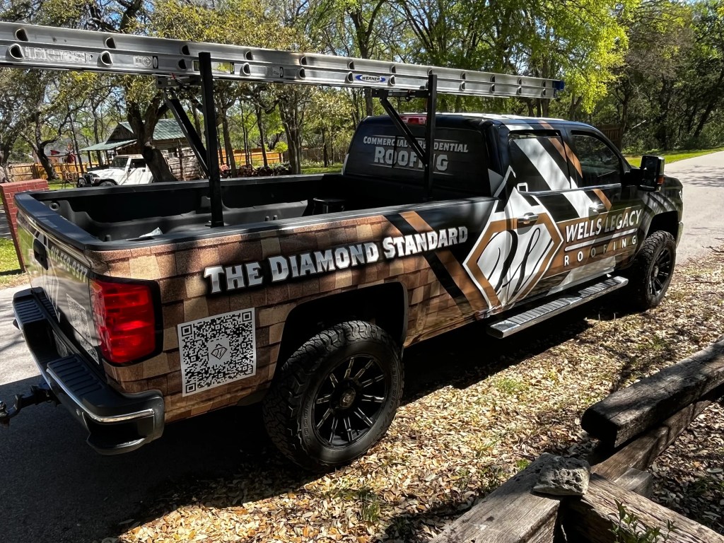 Full vehicle wrap for Wells Legacy Roofing on a Chevrolet Silverado HD by 1st Class Graphics in Mansfield, TX