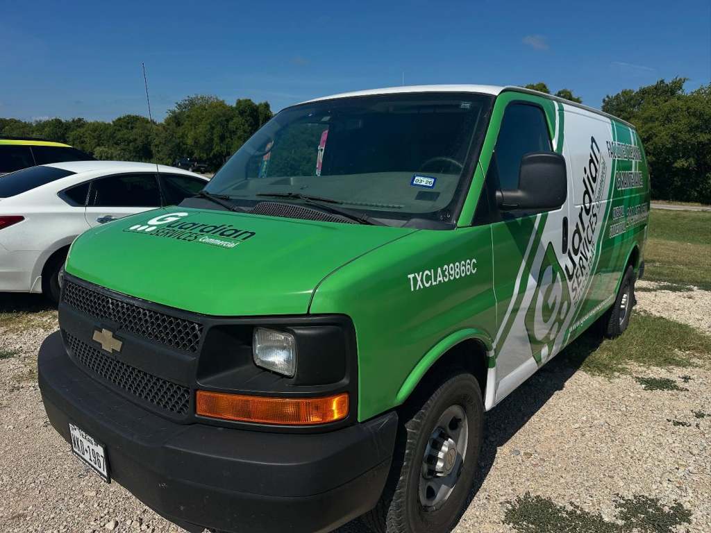 Van wrap for Guardian Services on a Chevrolet Express by 1st Class Graphics in Mansfield, TX